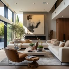 a living room with couches, chairs and a fireplace