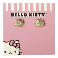 Add a touch of sparkle to your look with these Sanrio Hello Kitty Pave Crystal Stud Earrings. Featuring the iconic Hello Kitty face adorned with shimmering pave crystals, these studs are both playful and elegant. Perfect for Hello Kitty fans, these earrings are a charming addition to any jewelry collection. Hello Kitty Face, Earring Trends, Hoop Earring Sets, Crystal Stud Earrings, Accessories Jewelry Earrings, Stud Earring, Shop Earrings, Earring Set, Jewelry Collection