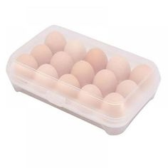 a plastic container filled with eggs on top of a white surface