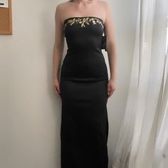 Featuring Nwt. Great Condition! Tagged 5 Model Is A Size Small. New Drops Every Week Updated, Faster Shipping Times (M-W-F) + Little Extras In Every Order Model Measurements: Height 5’5" Waist 26" Hips 37" Bust 32c Strapless Embellished Evening Dress, Embellished Strapless Dress For Evening, Black Embellished Strapless Dress, Black Strapless Floor-length Prom Dress, Black Embellished Strapless Evening Dress, Black Strapless Floor-length Dress For Prom, Black Floor-length Strapless Dress For Prom, Strapless Chiffon Evening Dress, Black Strapless Evening Dress For Prom Season