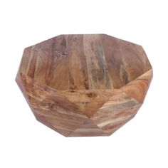 a wooden bowl sitting on top of a white surface