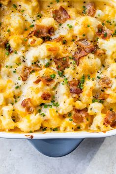 a casserole dish with cheese and bacon