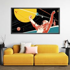 a living room with a yellow couch and a painting on the wall above it that has an image of a man holding a tennis racket