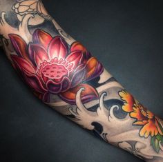 a person with a flower tattoo on their arm