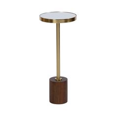 a brass and wood table with a glass top