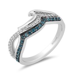 Let this Moana inspired wave ring be a reminder of your own inner explorer, ready to set sail on the grandest of journeys. At its foundation lies a mesmerizing london blue topaz wave pattern, its deep azure hue capturing the essence of the vast, untamed sea. Above it, a delicate dance of intertwined sterling silver and white diamond waves unfold, each facet meticulously polished to reflect the play of light on the water's surface. These waves symbolize the dynamic nature of the sea, its ever-cha Moana Wave, Enchanted Disney, Enchanted Disney Fine Jewelry, Disney Fine Jewelry, Wave Ring, Jewelry Sterling Silver, Set Sail, Shop Engagement Rings, Size 10 Rings