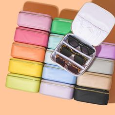 several pairs of sunglasses are in a case