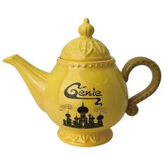 a yellow teapot with the word genie on it