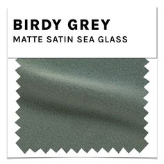 birdy grey matte satin sea glass fabric with white stitching on the bottom