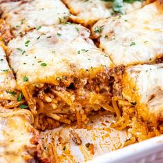 a casserole dish filled with meat and cheese