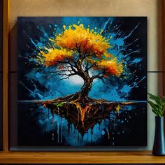 an abstract painting of a tree with yellow and orange leaves on it's trunk