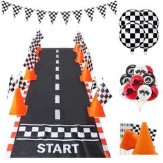 a race themed birthday party set up with balloons, streamers, and paper decorations