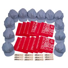 a group of red bandannas sitting next to each other on top of a white surface