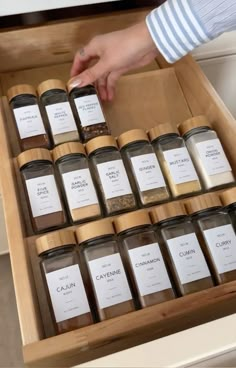 a drawer filled with lots of different types of spices