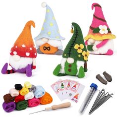 three gnomes made out of felt and sewing tools, including needles, thread, scissors and needle tips