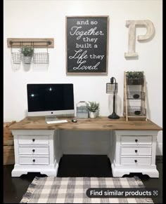 a desk with two drawers and a computer on it