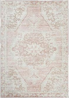 an area rug with various colors and patterns on the floor, including pinks and browns