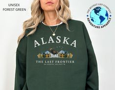 GROUP DISCOUNTS 10% OFF 3-5 Items | Code: GROUP3 15% OFF 6-19 Items | Code: GROUP5 20% OFF 20+ Items | Code: GROUP20 PRODUCT DETAILS & SIZING Alaska, known as "The Last Frontier," is famous for its vast wilderness, towering mountains, and incredible wildlife, including bears, moose, and whales. With stunning natural beauty, including the northern lights and over 3 million lakes, it offers unmatched opportunities for adventure and exploration. Our Alaska sweatshirt is available in multiple differ Flagstaff Arizona, Estes Park Colorado, Adventure Shirt, Sweater Fits, Estes Park, Limassol, New Hampshire, Wyoming, Pullover Sweatshirt