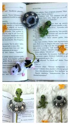 an open book with crocheted animals and flowers on it, next to the pages