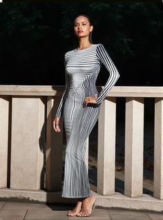 Chester Long Sleeve Stripe Printed Maxi Dress Step into sophistication with the Chester Long Sleeve Stripe Printed Maxi Dress, a versatile addition to any wardrobe. Crafted from ultra-soft and breathable 100% polyester, this dress offers all-day comfort while maintaining its stylish edge. Fashionable Features The elegant stripe pattern on this maxi-length dress is both trendy and timeless, making it perfect for a variety of occasions—whether you're heading to a casual brunch or an evening gala.