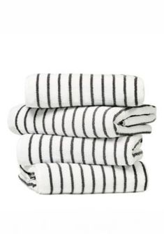 four black and white striped towels stacked on top of each other