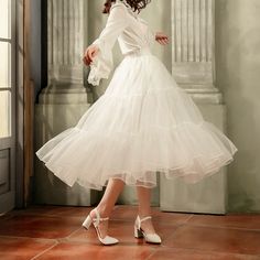 Elevate your outfit with the white 85cm daily A-line long layered petticoat. This versatile petticoat adds volume and dimension to your favorite skirts and dresses, creating a stunning A-line silhouette. The 85cm length provides ample coverage and the layered design adds a touch of whimsy to your look.  Please note that this product includes only the petticoat.  Garment Size   	 		 			Size 			Free Size 		 		 			Full Length 			85 		 		 			Waist 			58-90 Tulle Bridesmaid Skirt, Tulle Skirt Bridesmaid, Bridesmaid Skirt, Pink Trucker Hat, Bridesmaid Skirts, Tulle Bridesmaid, Y2k Kawaii, Cardigan Y2k, Gothic Skirts