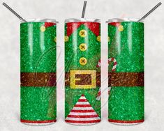 two green christmas soda cans with santa claus's hat and candy canes on them