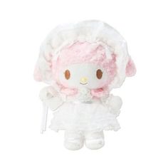 a hello kitty stuffed animal in a white dress