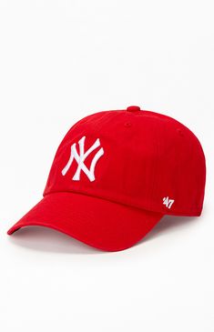 Sport timeless style with the NY Yankees Dad Hat from 47 Brand. This classic cap not only showcases your team spirit with the iconic NY Yankees logo but also offers a laid-back and comfortable fit, making it the perfect accessory for any casual day out.


	Solid color dad hat
	Canvas construction
	NY embroidery
	Curved brim
	Breathable eyelets
	Adjustable strap
	One size fits most Trendy Red Dad Hat, Red Hat, Red Fitted Hat For Baseball Season, Red Yankees Hat, Nyc Yankees Hat, Ny Yankees Logo, Red Fitted Hat For Game Day, Baseball Season, Yankees Logo, Reds Baseball