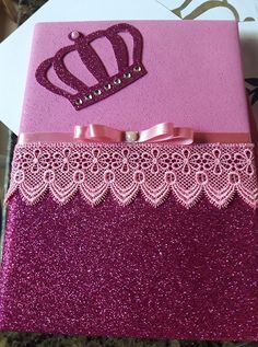 a pink box with a tiara on it