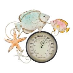 a clock with two fish on it and one starfish hanging from the side, against a white background