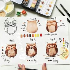 someone is painting an owl with watercolors