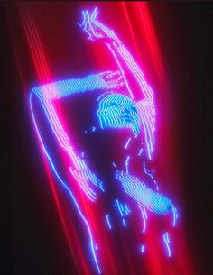 a person is dancing in the dark with neon lights