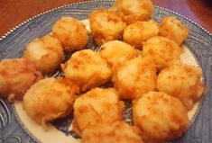 fried food on a blue and white plate