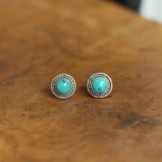 These .925 Sterling Turquoise Post earrings are the perfect size and just the right amount of detail - a boho jewelry staple! Two, graduated .925 Sterling Silver twist wires embellish the Turquoise stones and are the perfect accent for what we call our Western Turquoise Posts. They are available in the shop in many stones. Just a perfect little design ... why not spread the love. Post earrings are a staple of any jewelry wardrobe. These posts are the quintessential turquoise studs -- gorgeous, n Turquoise Wedding Earrings, Turquoise Earrings Studs, Turquoise Western Jewelry, Stone Earrings Studs, Rodeo Jewelry, Turquoise Stone Earrings, Western Turquoise, Boho Turquoise, Turquoise Western