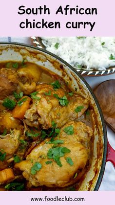 chicken curry in a red pot with white rice