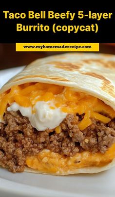 taco bell beef 5 - layer burrito copycat is shown on a white plate