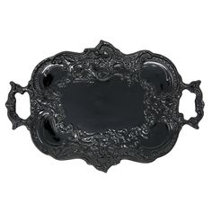 a black tray with ornate designs on the edges and sides, set against a white background