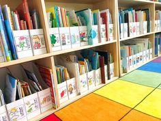 children's books are lined up on the shelves in a child's library