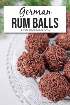 german rum balls on a glass plate with text overlay