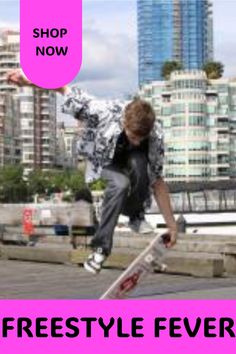 a man doing a trick on a skateboard in front of a cityscape