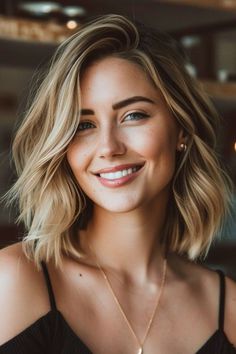 Save this pin for the best medium-length layered haircuts. This textured lob with a side part falls gracefully above the shoulders. Soft waves throughout add volume to the classic bob silhouette. Shoulder Hair, Lob Hairstyle, Lob Haircut, Shoulder Length Hair Cuts, Medium Hair Cuts, Shoulder Length Hair