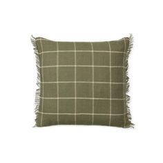 a green and white plaid pillow with fringes on the edges, in front of a white background