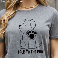 Talk To The Paw Dog Funny Graphic 100% Cotton Short Sleeve Tee Shirt (Plus Size Available) This Top Is For Those Days When You Would Rather Not Be Bothered But Want A Funny Way Of Saying It. Features A Cute Dog With A Paw Up In A Solid Contrasting Color. The Bottom Of The Graphic Has Talk To The Paw In Bold Lettering. No Matter If You Own A Pet Or Not This Is Just So Funny. Short-Sleeve Breathable 100% Premium Cotton T-Shirt. Comfortable, Lightweight, Slightly Stretchy. Perfect For Pairing With Preppy Funny, Shirts Preppy, Bold Lettering, Dog Funny, Dog Mom Gifts, Trendy Tee, Funny Graphics, T Shirts With Sayings, Cute Dog