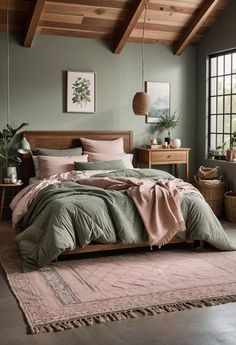 a bedroom with green and pink bedding, rugs and wooden ceiling beams in the corner