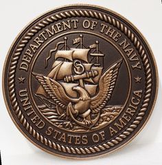 the seal for the department of the navy is shown in gold and black on a white background