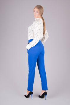 "Details Details: This beautiful pants are very comfortable and elegant suitable for business. It's used high quality materials for manufacturing them. They are straight leg pattern. You can wear them them in different occasions formal or casual. Classic Line trousers. Elegant style, suitable for any type figure. Pockets, with zip fastening on the back. It's part of the collection \"Face Off\". Made with a lot of attention and love in our Bulgarianian design studio. Fabric & Color: Wool I Ac Stretch High-waisted Pants For Business, Elegant Blue Wide Leg Pants For Work, Office Lady Pants With Pockets, Semi-formal Stretch Straight Leg Pants, Semi-formal Stretch Trousers, Stretch Semi-formal Ankle Pants, Office Lady Workwear Pants With Pockets, Tailored High Waist Work Pants, Office Lady Workwear Bottoms With Pockets