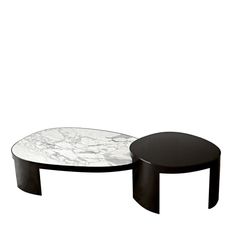 two black and white tables sitting next to each other