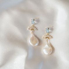 This item is unavailable - Etsy Freshwater Pearl Earrings Wedding, Blue Pear-shaped Earrings For Weddings, Blue Teardrop Pearl Drop Earrings, Blue Teardrop Pearl Earrings, Blue Teardrop Pearl Earrings For Pierced Ears, Handmade Light Blue Wedding Earrings, Handmade Pear-shaped Wedding Earrings, Blue Pearl Drop Earrings For Anniversary, Blue Drop Earrings For Wedding