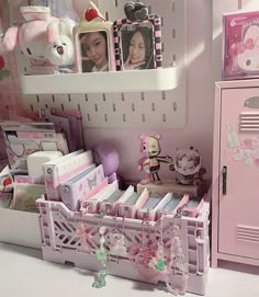 there is a pink toy room with toys in the shelves and pictures on the wall